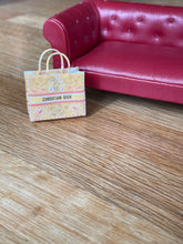 Cargar imagen en el visor de la galería, Dollshouse Miniature Dior book bag 1:12th scale
