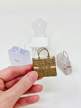 Cargar imagen en el visor de la galería, Dollshouse Miniature Dior book bag 1:12th scale

