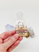 Cargar imagen en el visor de la galería, Dollshouse Miniature Dior book bag 1:12th scale
